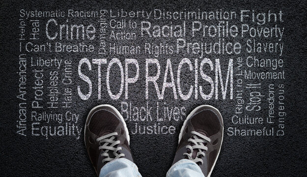 Stop Racism Word Cloud On Asphalt Concept Of Fighting Discrimination