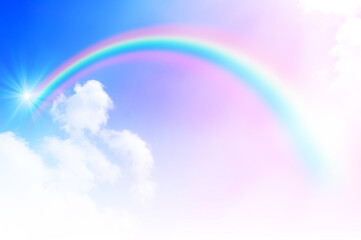 The Rainbow sky is Colorful sky with Soft clouds and a rainbow crossing. Fantasy magical sunny sky pastel background is fluffy white cloud. Freedom wallpaper concept. Sweet color dream.
