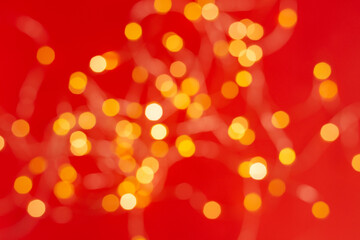 Christmas holiday background with festive bokeh on red background. Ready-to-install products. blur and bokeh. holiday blur lights. copy space. space for text
