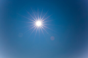 bright sun in a bright blue sky