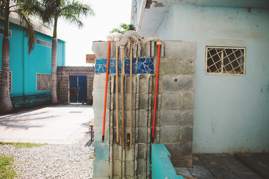 Brooms, Mops, & Colorful Buildings
