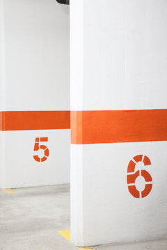 Parking walls with lines and numbers.