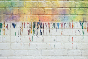 Raining Colours on a White Brick Wall