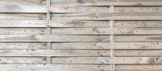 Wooden background with intertwined wooden slats, vintage wood