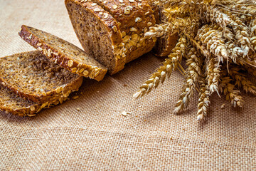 Home baked bread. Rye bakery with crusty loaves and crumbs. Fresh rustic traditional bread with...