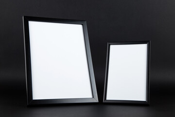A photo frame on black background, a blank for the design, mockup, template. Copy space.