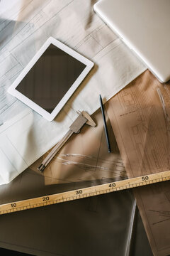 Architect desk with tablet and tracing paper