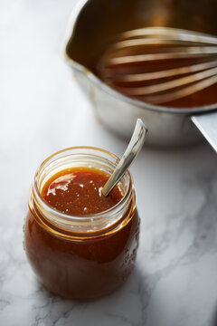 Homemade dulce de leche in a jar