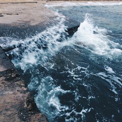 waves crashing on rocks