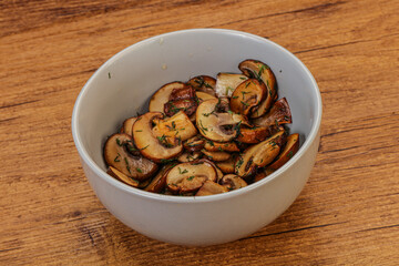 Roasted champignon with herbs and spices