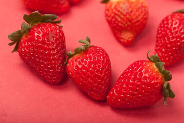strawberries on a red background