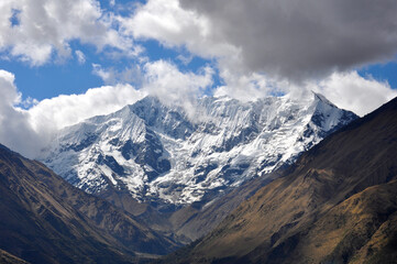 Snow capped mountains in the Andes along the Salkantay trek in Peru