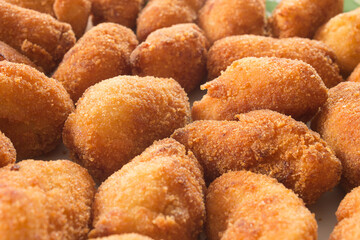 Close-up of delicious and crunchy golden croquettes. Learn easy cooking at home.