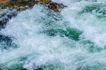 Obraz premium in summer rocky mountain river water silk. mountain river