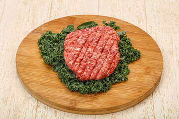 Raw beef burger cutlet for cooking