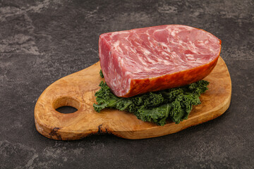 Beef ham piece over board