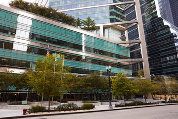 Green and glass environmentally friendly urban architecture for sustainability in city center downtown.
