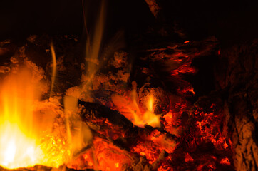 Naklejka premium embers burn down in a hardwood fire