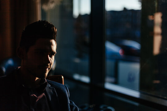 Young Businessman Waiting in a Longe Room