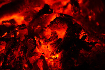 embers burn down in a hardwood fire - 380400360