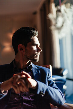 Young Businessman Waiting in a Longe Room