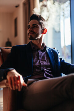 Young Businessman Waiting in a Longe Room