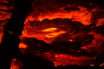 embers burn down in a hardwood fire