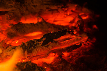 embers burn down in a hardwood fire - 380402700