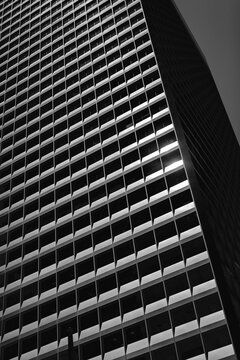 Black and white image of a high rise building in downtown San Francisco.