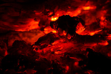 embers burn down in a hardwood fire - 380403972