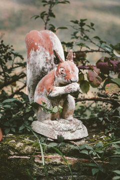 Ceramic Statue of a Squirrel in the Garden