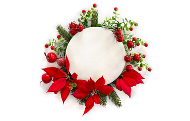 Christmas decoration. Flowers of red poinsettia, red berries, red apples, twigs christmas tree with white circle paper card note with space for text on white background. Top view, flat lay