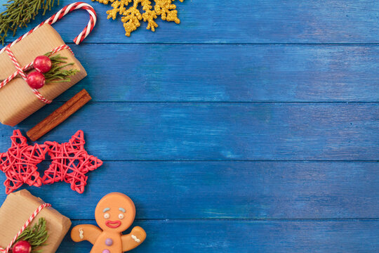 Christmas background with decoration on blue wooden table with copy space