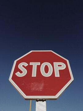 Stop Sign Over a Blue Sky