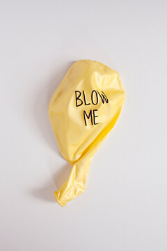 Blow Me handwritten message on balloon ready to be inflated