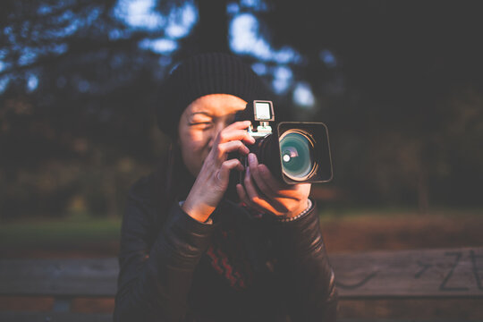 Woman with analog camera