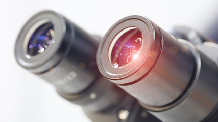 Close up of microscope lenses