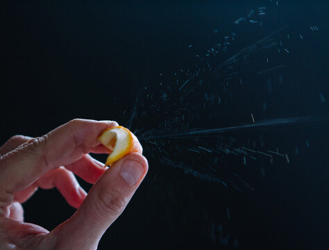 Old Fashioned Drink 2 dashes Angostura Bitters, zest of orange, whiskey, sugar cube, ice, stir