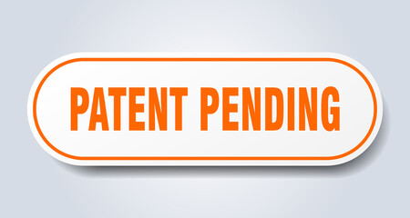 patent pending sign. rounded isolated button. white sticker