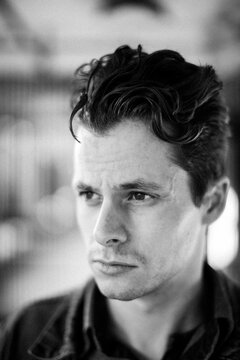 Young fashionable man with sweet hair