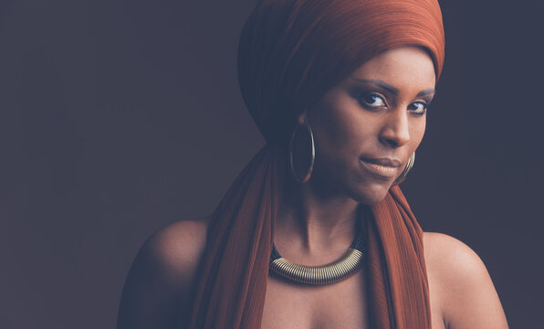 beautiful african woman wearing a traditional headwrap