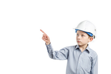 boy in yellow construction helmet on white