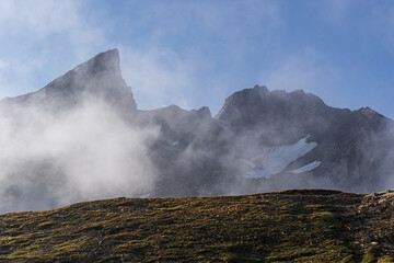 The glaciers, mountains and meadows of the alta val formazza at dawn, during a summer day, near the town of Riale, Italy - July 2020.