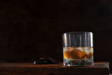 cold alcoholic drink in a glass stock on wooden table