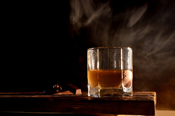 cold alcoholic drink in a glass stock on wooden table