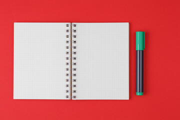 open notebook with colored markers