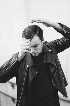Punk rocker combing his hair