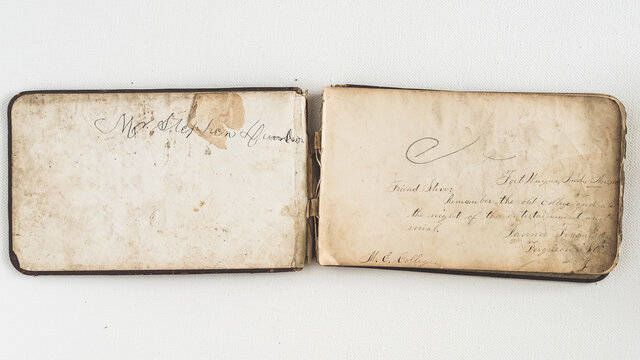 An Antique Autograph Book With Handwritten Notes