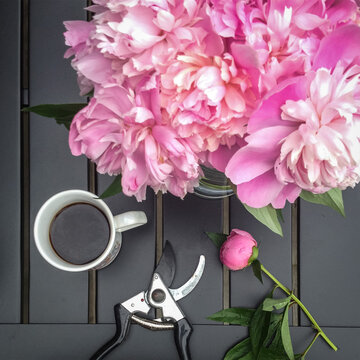bouquet of peonies on a black table