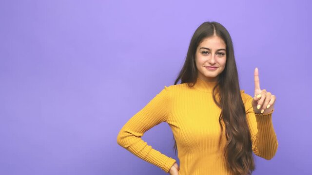 Young caucasian woman showing number one with finger